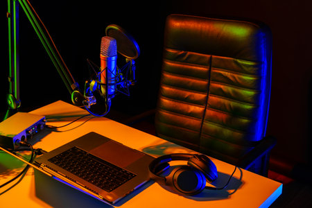 Home studio podcast interior. Microphone, table and chairの写真素材