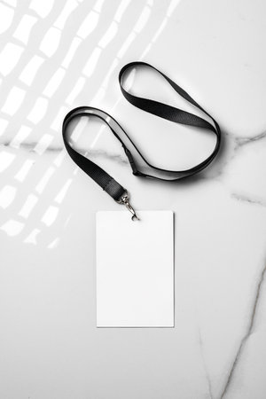 Blank nametag on gray background copy spaceの写真素材