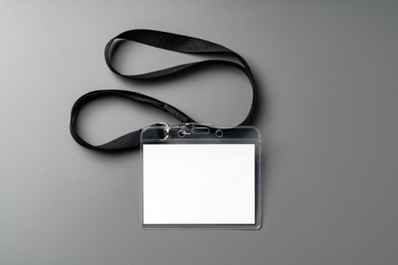 Blank nametag on gray background copy spaceの写真素材