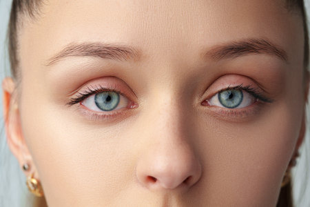 Close up of a young woman with nude make upの写真素材