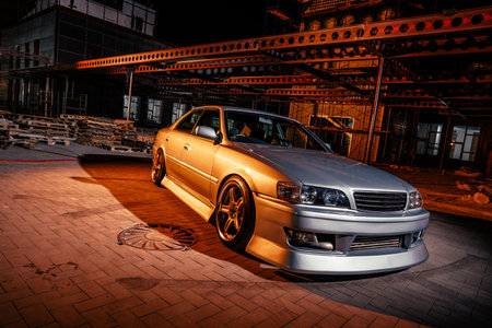 Silver Car Parked in Front of Building
