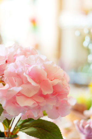 Pink Flowers in Vase on Tableの写真素材