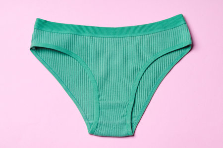 Womens panties on pink background with copy spaceの写真素材