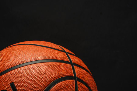 Close Up of Basketball on Black Backgroundの写真素材