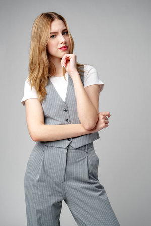 Young Woman Wearing Gray Suit and White Shirtの写真素材