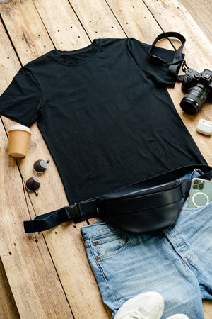 T-shirt with jeans shorts placed on the wooden backgroundの写真素材