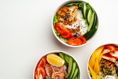 Tasty take out poke bowls isolated on white backgroundの写真素材
