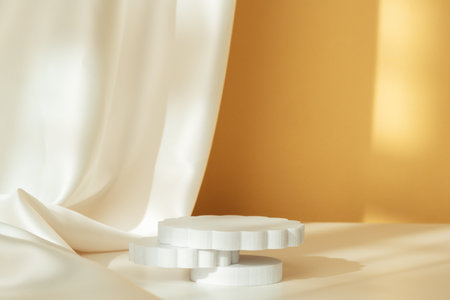 Elegant Minimalist Still Life Composition Featuring Soft Fabrics and Simple Objects in Warm Evening Lightの写真素材