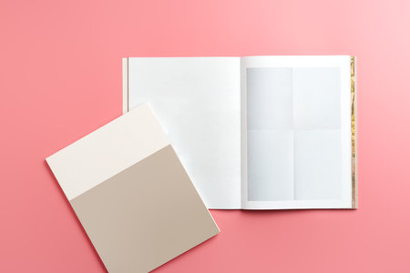 A Collection of Blank Papers Stacked on a Pink Surface for Creative Projectsの写真素材