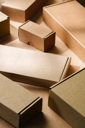 Multiple cardboard boxes arranged on a surface for packaging and shipping in a warehouse settingの写真素材