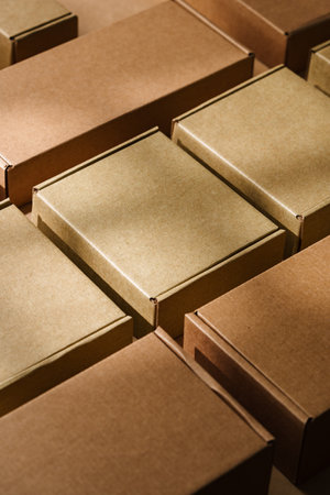 Multiple cardboard boxes arranged on a surface for packaging and shipping in a warehouse settingの写真素材
