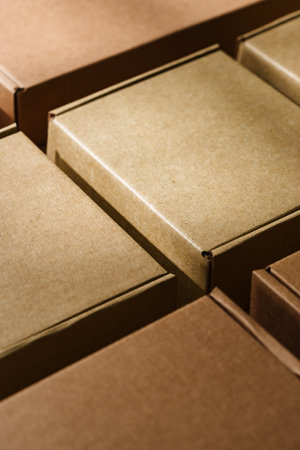 Multiple cardboard boxes arranged on a surface for packaging and shipping in a warehouse settingの写真素材