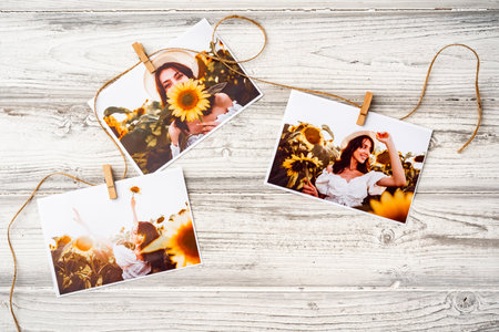 Printed colorful photos of women portraits against gray backgroundの写真素材