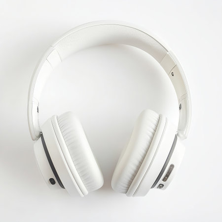 Stylish white wireless headphones perfect for music lovers and audiophiles at home or on the goの素材