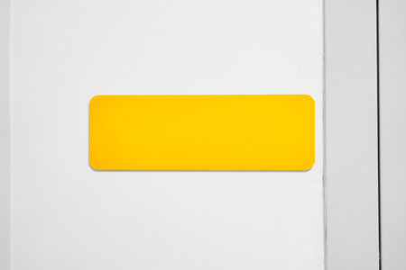 Bright yellow rectangular label on a plain white background perfect for organizational tasks or...