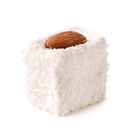 Delicious coconut treat with almond topping served on a white background perfect for desserts or snacksの写真素材