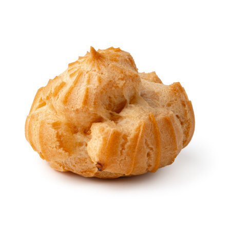Delicious cream puff dessert with a golden brown crust and light texture displayed on a plain...