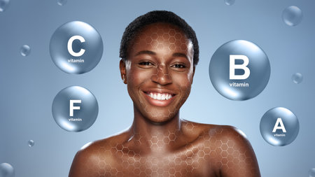 Skin health benefits of vitamins highlighted by a smiling woman with a glowing complexionの写真素材