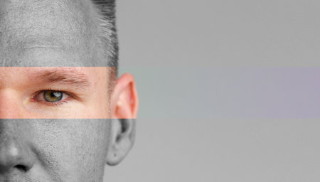 Portrait featuring a close-up of a mans half face with a gradient effect showcasing facial features and expressionの写真素材