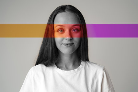 Unique artistic portrait of a woman with colorful overlays in a minimalist settingの写真素材