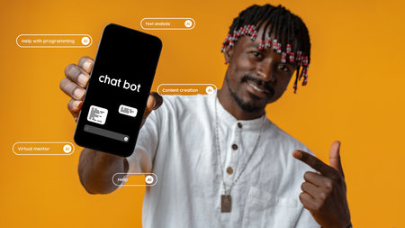 Innovative user showcasing chatbot features with smartphone against vibrant orange background in creative settingの写真素材