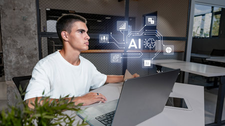 Young professional engaging with artificial intelligence software in a modern office setting during daytimeの写真素材