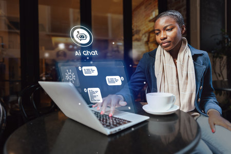 Young woman engages in virtual conversation at a cafe, using laptop in a modern workspace during the...