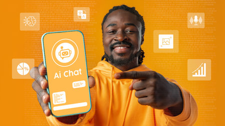 Young man showcasing AI chat application on smartphone with vibrant orange background in a tech-focused environmentの写真素材