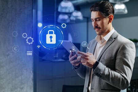 Business professional using a tablet with data security symbols in a modern office environment...