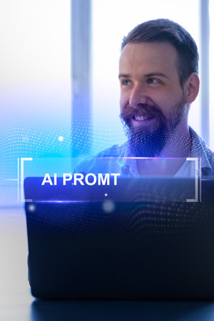 Professional man focused on computer screen while exploring artificial intelligence technologies indoors during daytimeの写真素材