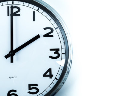 Close up of a wall clock.