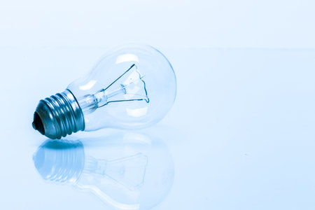 Close up of a light bulb on white background