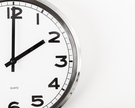 Close up of a wall clock.