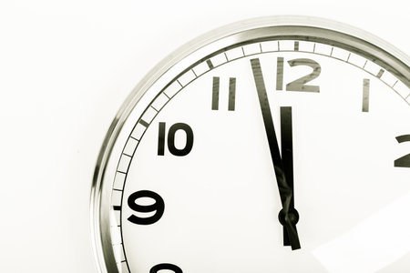 Close up of a wall clock. Time management concept