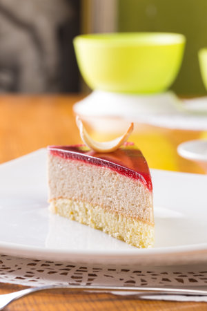 Berry souffle cake slice on table close up