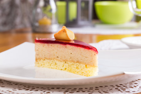 Berry souffle cake slice on table close up