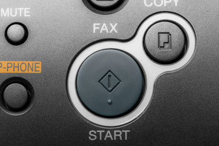 Black fax machine tool close up, business concept