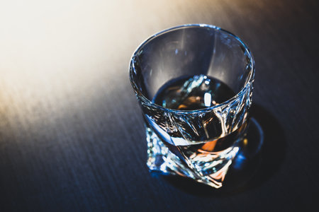 Strong alcoholic drink in glass close up