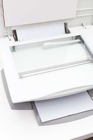 White printer on table close up in office