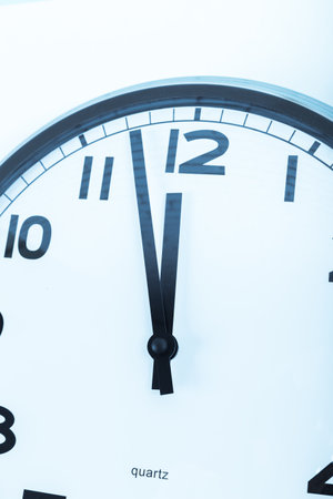 Close up of a wall clock.
