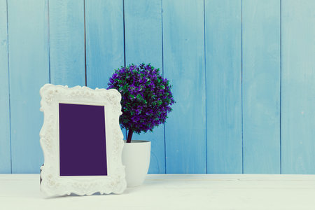 Wooden items of home decor close up on blue wooden background
