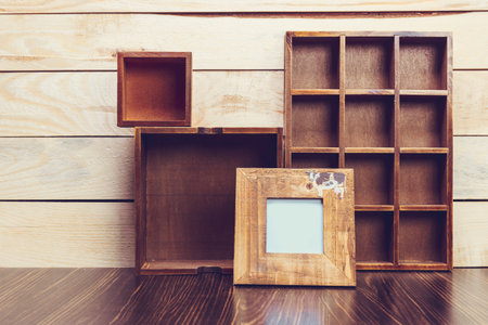 Cozy wooden home decor objects on blue background
