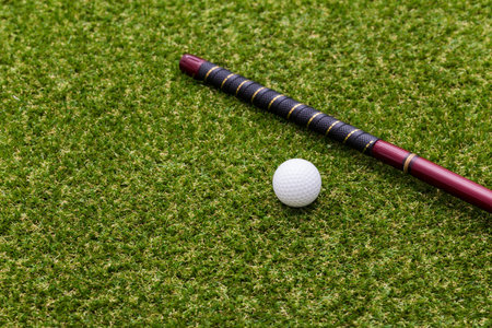 Close up of mini golf equipment on grass
