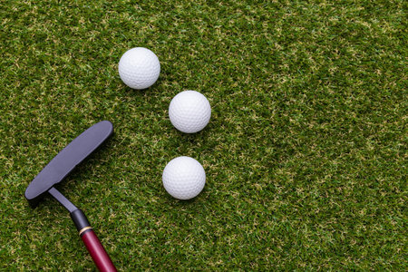 Mini golf equipment on grass close up