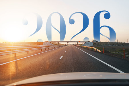 Highway view with a distant bridge and the year 2026 displayed at sunset