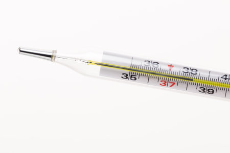 Thermometer showing body temperature measurement in degrees Celsius