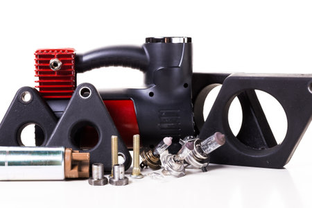 Various mechanical components arranged for inspection in a workshop setting