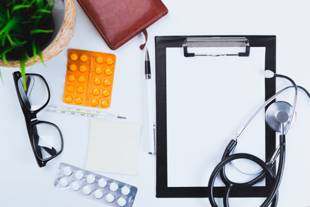 Medical tools and supplies organized on a desk for a health consultation
