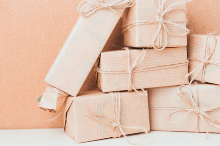 Gift-wrapped packages arranged neatly on a table for celebration during holiday season