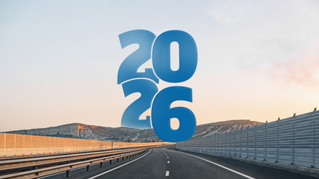 Years 2026 and 2026 sign on an empty highway under a clear sky at sunset